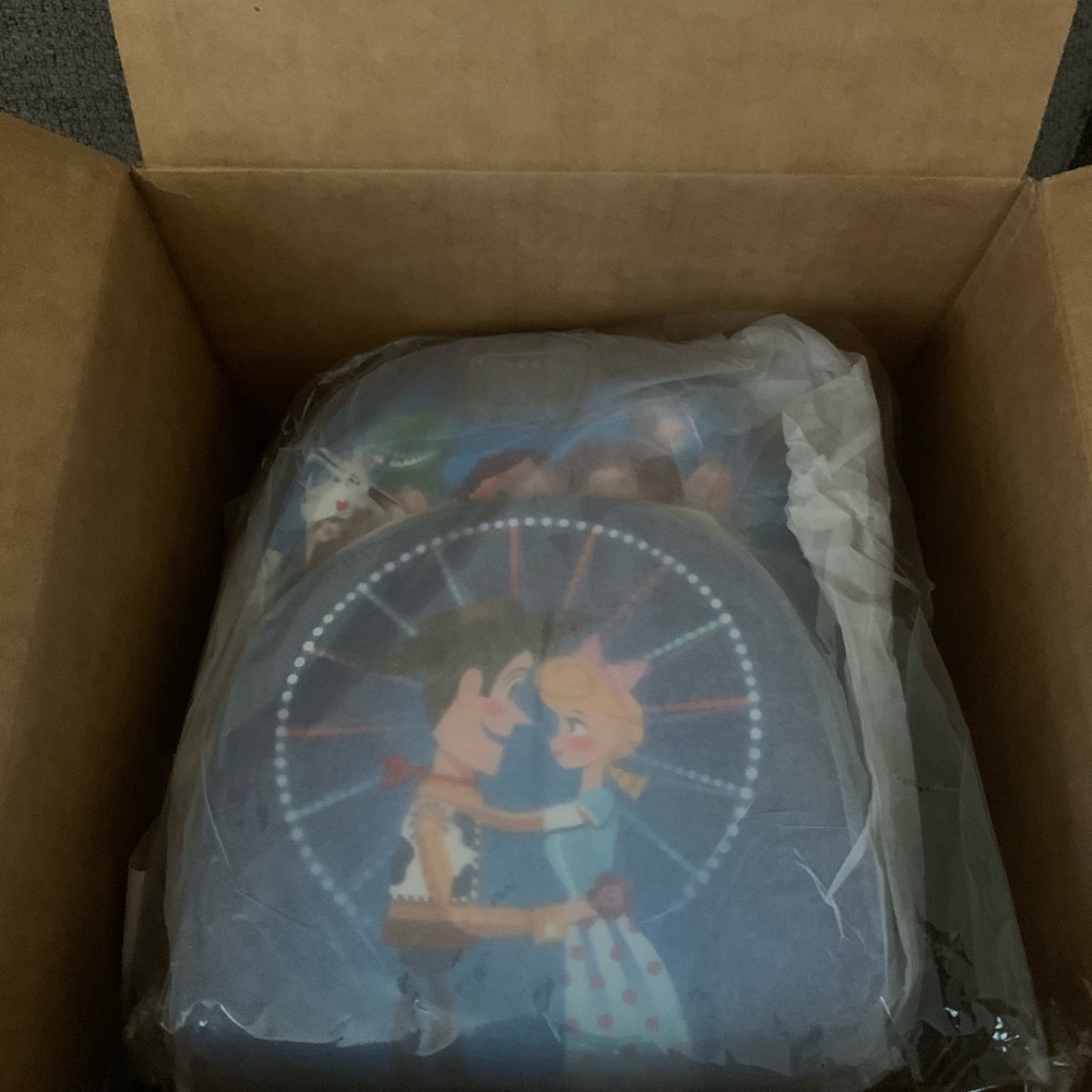 Loungefly Pixar Blue Kids Backpack